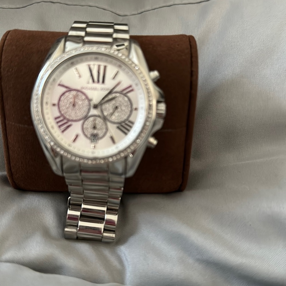 Brand new with tags Michael Kors silver watch.